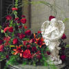 Large Red Fresh Arrangement with Concrete Angel designed by Haehn Florist in