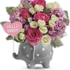 Celebrate a sweet girl&#039;s arrival with this precious ceramic elephant, bursting with