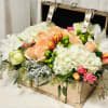 Blooms of hydrangeas , roses, and tulips fill up this stunning golden