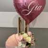 Premium floral designed in our signature carriage box with a personalized balloon