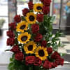RED ROSES WITH SUNFLOWERS ONE SIDE IN BASKET 