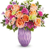 Peach roses, fuchsia carnations, peach miniature carnations, green cushion spray chrysanthemums, purple