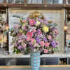 The &quot;Grand Garden Delight Vase&quot; exudes elegance with a lush blend of