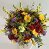 The &quot;Vibrant Garden Vase&quot; is a lively and colorful arrangement that bursts
