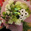 Beautiful green everything: carnations, white daisies, mint, roses and lilies with green