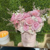 A pastel or colorful flowering hat box brings peace to any space.