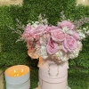 A pastel or colorful flowering hat box brings peace to any space.