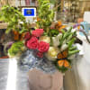 A pastel or colorful flowering hat box brings peace to any space.