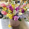 A pastel or colorful flowering hat box brings peace to any space.