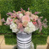A pastel or colorful flowering hat box brings peace to any space.