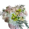 A pastel or colorful flowering hat box brings peace to any space.