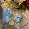 Variety of flowers, and an orchid in the vase 