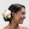 This hairpiece is perfect for the bride, bridesmaids, or even Mom, featuring