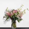 Glamorous and eye-catching, our modern tropical centerpiece is perfect for your tables