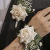 white one rose Corsage with some touches of baby breath and boutonnier