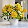  A vibrant and uplifting arrangement that radiates warmth, joy, and elegance&mdash;perfect