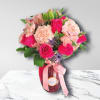 &bull; Carnations
&bull; Roses
&bull; Alstroemeria
&bull; Foliage
&bull; Glass vase