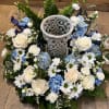 Blue and White Urn Wreath, seasonal florals in blue and white.