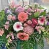 Beautiful roses, hydrangea and gerber daisies in soft pink and peach tones