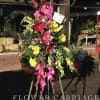 The bright main colors of this arrangement will help celebrate the special