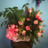 Double basket with green plant and beautiful floral arrangement
Picture will not look