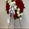 Oasis Floral Foam Solid Heart design covered in Red Carnations with a
