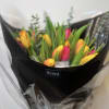 Nothing brightens a space like a bouquet of tulips. With their vibrant