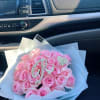 A stunning arrangement of pink roses, symbolizing sweetness and admiration. Paired with