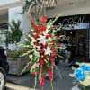 A standings flower arrangement for a funeral service is a heartfelt tribute