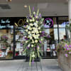 A standings flower arrangement for a funeral service is a heartfelt tribute