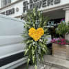 A standings flower arrangement for a funeral service is a heartfelt tribute