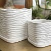 Modern square, ceramic planter in white with built in saucer. 

*Available in