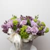 This arrangement comes with a mix of lime, green and lavender lilac