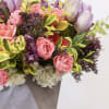 Arrangement comes with the following flowers; hydrangea, lilac, tulips, spray roses, with