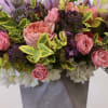Arrangement comes with the following flowers; hydrangea, lilac, tulips, spray roses, with