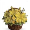Yellow lilies, yellow roses, yellow gerberas, greens in a basket with a