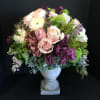 fragrant lush bouquet in a traditional urn