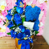 This arrangement comes in many colors of roses and bear. Please add