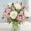 Our elegant bouquet in shades of blush pink and creamy white brings