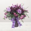 This monochromatic purple arrangement is perfect for any event ranging from a