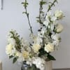 Blooming branches, sweet peas, roses, stock. 

*This arrangement is dependent on floral