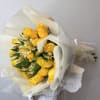A radiant blend of yellow roses and alstroemeria, wrapped in soft, perfect