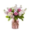 This beautiful blush vase is filled with fragrant stock and pastel roses