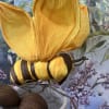 A Raffia bee to make someone smile. Comes with a string for
