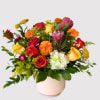 Joyful, vibrant, and full of life, our Dancing Queen arrangement features hydrangeas