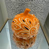  A ceramic pumpkin designed to emit a warm, cozy light, perfect