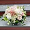 We will put together a lush arrangement in a lovely color palette