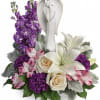 This elegantly sculpted angel is a comforting symbol of love and peace.