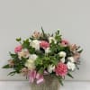 Get a pink and white themed arrangement to welcome that new little