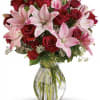 Lovely reds and pinks come together in this lavishly romantic anniversary gift.